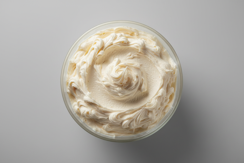 great now put it in a clear bowl and looking down on the tallow from above still with the grey background